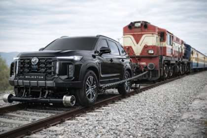 MG Majestor pulling a heavy locomotive train showcasing its power and world record performance