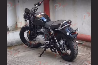 Triumph Bonneville 400 spy photo showing classic retro design with round LED headlamp and wire spoke wheels