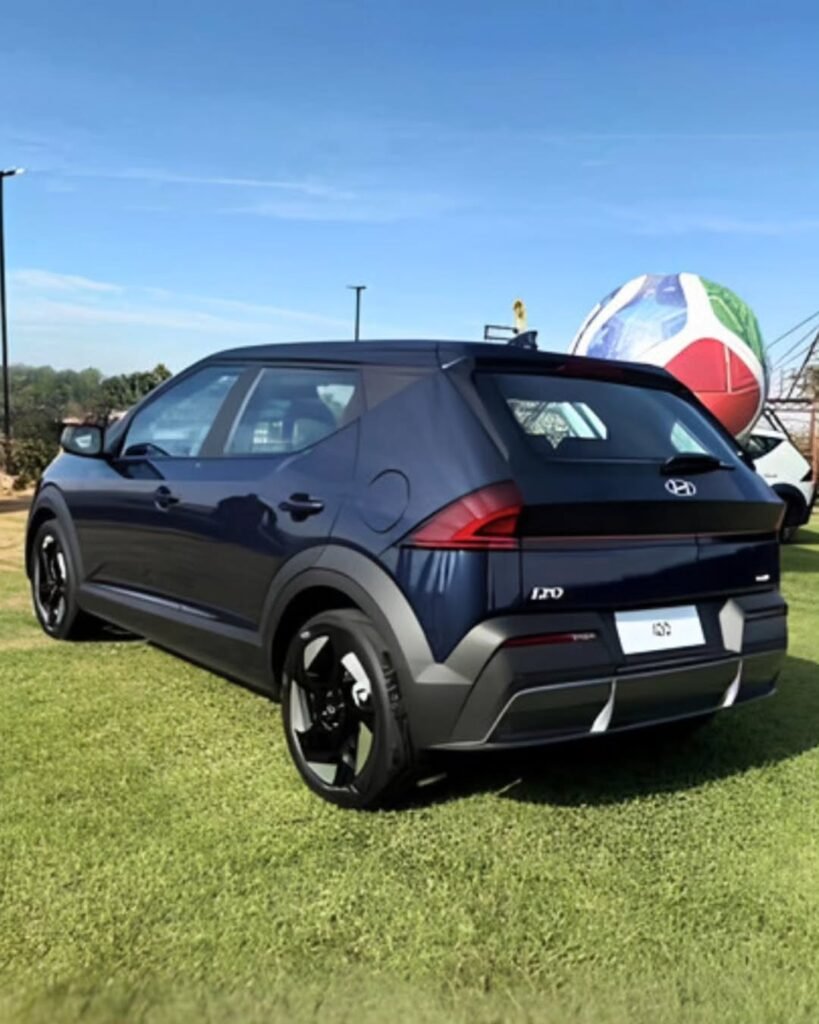 hyundai i20 2026  rear profile image, 2027 Hyundai i20 rear design showing flat upright tail with connected LED light bar and plastic cladding compared to Fiat Uno by Indian buyers