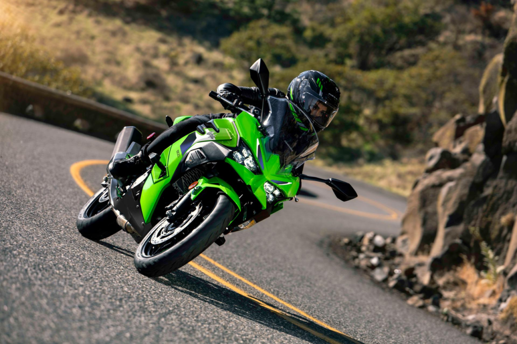 2026 Kawasaki Ninja 500 sportbike showcasing its aggressive Ninja styling and aerodynamic design. The motorcycle features a powerful 451cc parallel-twin engine, sporty bodywork, sharp fairings, and a rider-focused stance, highlighting the blend of everyday usability, performance, and the iconic Ninja character designed to stand out on the road.